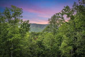 Relax on the deck with seating and Smoky Mountain views