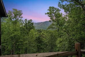 Relax on the deck with seating and Smoky Mountain views