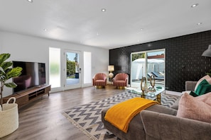 Impeccably designed modern furniture and design elements throughout