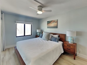 Primary Bedroom - King Bed, Smart TV, Balcony Access, Gulf Views and En Suite Bathroom