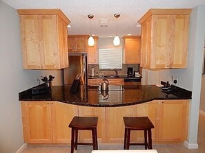 Kitchen - Granite counter tops and breakfast bar