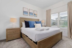 King Master Bedroom Downstairs. 

Beautiful new townhouse near Disney at ChampionsGate. Davenport. Private Pool. Resort Style Amenities. 