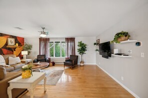Furniture, Indoors, Living Room, Floor, Flooring