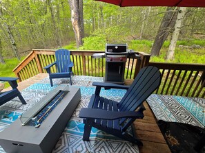 Rear deck with BBQ, propane fireplace and seating
