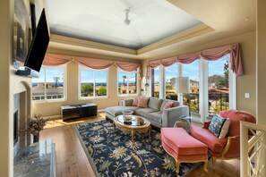 Sun-soaked sophistication with panoramic views—your dream living room is here.