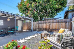 Unwind in this charming outdoor retreat! Enjoy your first cup of coffee/tea here.