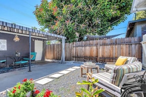 Unwind in this charming outdoor retreat! Enjoy your first cup of coffee/tea here.