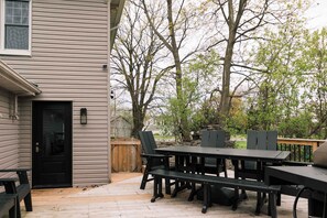 Large outdoor deck with dining, lounge chairs + BBQ