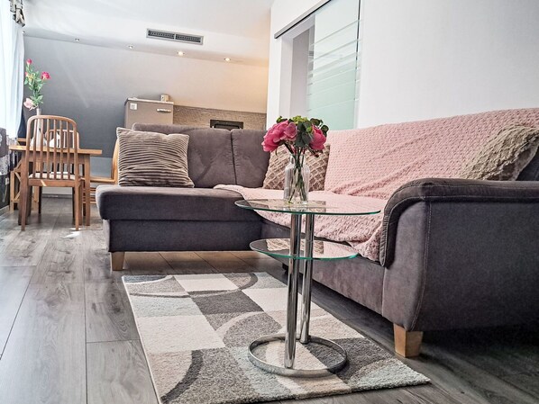 Furniture, Flooring, Interior Design, Floor, Couch, Wood, Living Room, Room, Home, Lighting