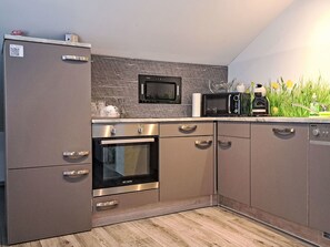 Kitchen, Kitchen Appliance, Major Appliance, Countertop, Cabinetry, Home Appliance, Flooring, Interior Design, Kitchen Stove, Furniture