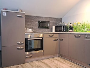 Kitchen, Kitchen Appliance, Major Appliance, Countertop, Cabinetry, Home Appliance, Flooring, Interior Design, Kitchen Stove, Furniture