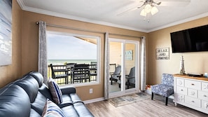 Dine and relax on the balcony with the new comfortable furniture.
