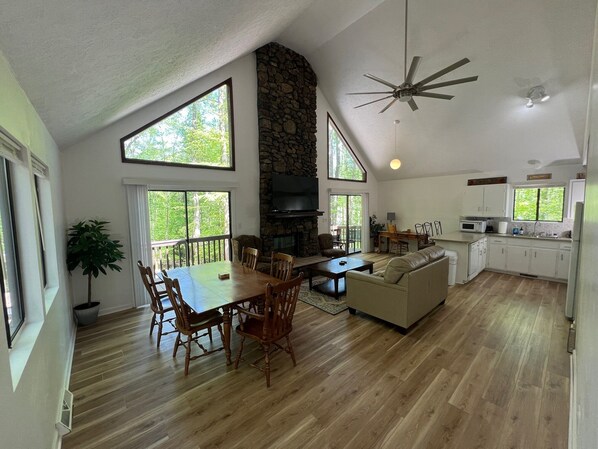 Great Room: Very Large Windows, Dining, Kitchen, TV, Couch, Workstation, Decking