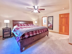 A king sized sleigh bed with cozy flannel duvet makes for the best night’s rest.