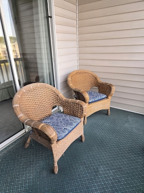 Balcony overlooking pond and fountain