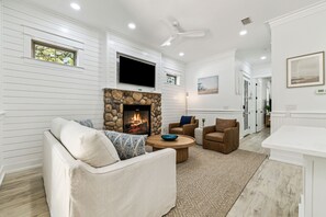Open concept kitchen, dining room, and living room. (Fireplace is for aesthetics at this moment. Please do not use or touch.)