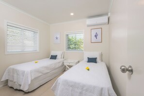 Second bedroom offers the flexibility of King bed or 2 x single beds.