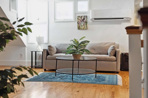 cozy living area with queen sleeper sofa
