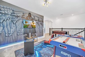  The Ultimate Game Room! Battle it out in air hockey & foosball, or jump into action on the PlayStation 5—all in a Star Wars-themed galaxy! ✨