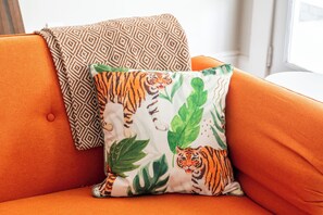 Orange you glad you are staying with us?  Check out our fun colors all throughout the property, plus TVs in every room and tons of games and books!