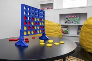 Welcome to the Game Room!!! Coffee table perfect for gaming, and two cozy beanbags for comfort and fun. We even have a Wii game console and games!