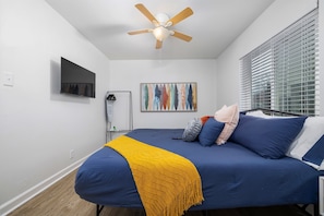Watch your favorite shows in a comfortable king size bed.