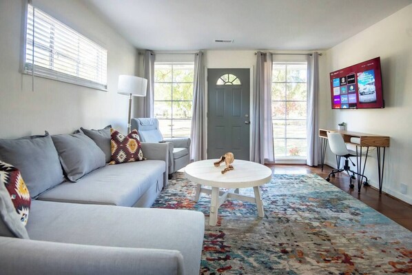 Large comfortable couch. Plenty of seating for your whole crew.