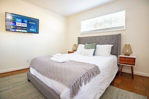 Master Bedroom equipped with two side tables