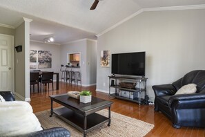 Spacious Living Area: Open-concept living room perfect for gathering and relaxing.