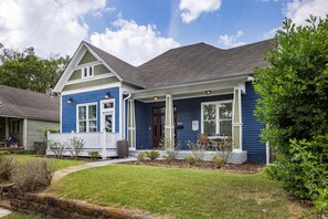Its eye-catching blue facade stands out, exuding a sense of personality and character. This unique exterior hints at the inviting space you'll discover inside. Get in touch to explore our custom concierge services and local experiences curated just for you
