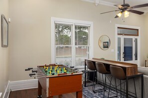 Welcome to our charming Historic Wilson Home! Step back in time and experience the allure of a bygone era, while still enjoying modern amenities. As a bonus, indulge in some friendly competition with our foosball table for hours of entertainment. 