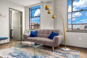 Chic living area with contemporary decor and large windows offering stunning views.