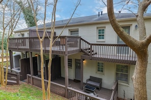 A closer look at the shared upper balcony, providing additional space to relax and take in the greenery.