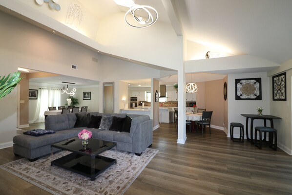 Living room, bar, and dining room