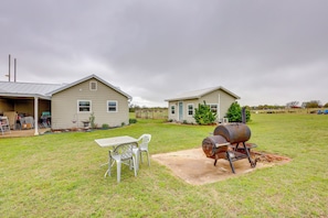 Property Exterior | Shared Grill Area | Designated Parking (2 Vehicles)