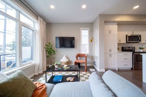 Living room with smart TV and Disney+