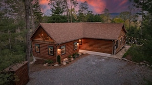Tucked among the trees, this is the kind of cabin that feels like a hidden treasure from the moment you arrive.