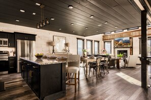 Cook and dine with a view—your kitchen offering both style and stunning mountain vistas.