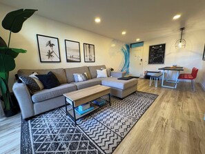 Enjoy ample space in the living area. Oversized couch pulls out to a full-size bed. 