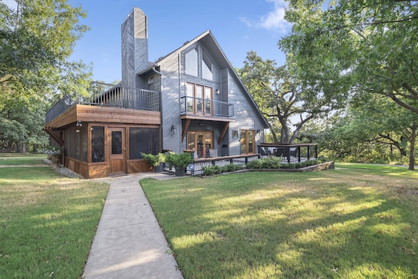 Regalo Main House offers luxury accommodations for 10 guests with modern amenities, spacious living areas, and a perfect vacation retreat on 3 acres.