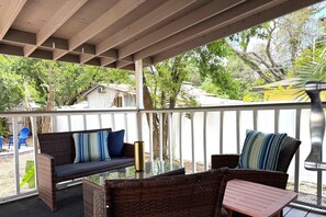 Hang out and chill on the covered deck lounge area