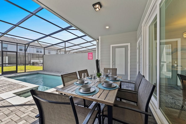 Private pool with outdoor dining