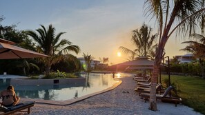 Enjoy a refreshing dip in the swimming pool with both deep and shallow ends