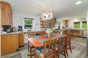 Gather around the stylish table with a view and make lasting memories!