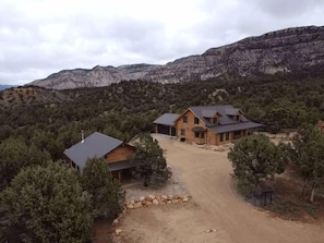 Turquoise Tumbleweed is the little cabin to the left in this photo. Her big sister, Pinyon Ridge, sits on the same property, to the right.