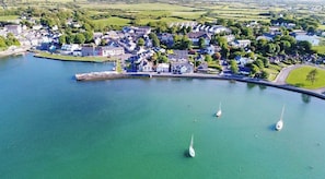 The colourful and vibrant village of Kinvara, set against the Burren landscape