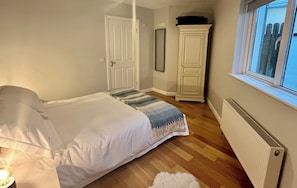 Master bedroom with king bed and ensuite.