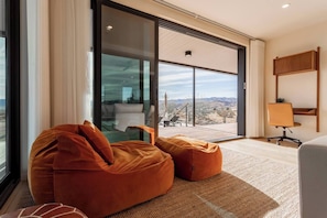 Curl up in our comfy bean bag, the perfect spot for lounging.