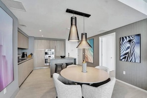 Dining room with a view of the kitchen