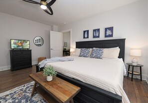 King bedroom with bathroom. *Note guest must walk through this bedroom to access the kitchen/dining, laundry room and second bedroom.